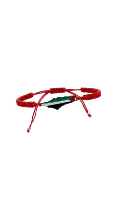 Red bracelet with a green and black design on a light gray background